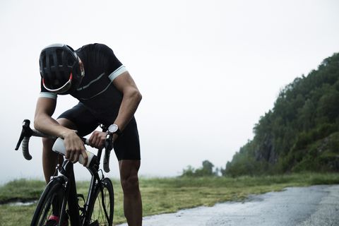 https://hips.hearstapps.com/hmg-prod.s3.amazonaws.com/images/male-race-cyclist-resting-by-mountain-road-royalty-free-image-1575397216.jpg?crop=0.99953xw:1xh;center,top&resize=480:*